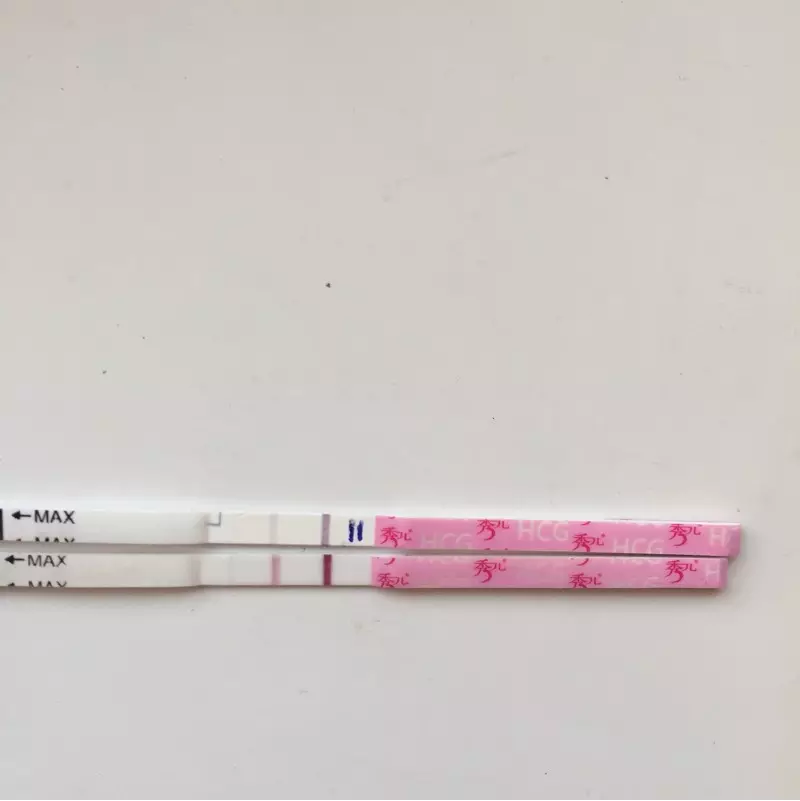 4、早孕试纸怎么看有没有怀孕:早孕测试纸怎么看出怀孕有图片吗